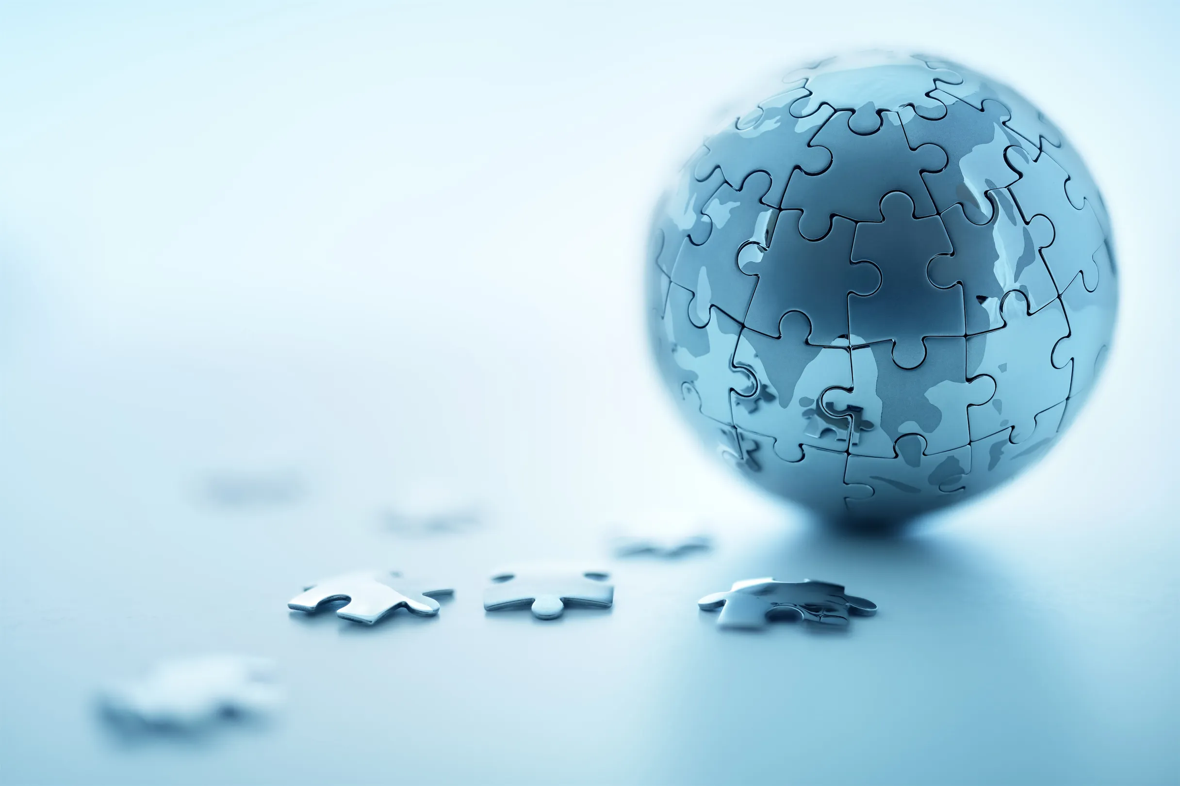 Picture of the globe made out of puzzle pieces